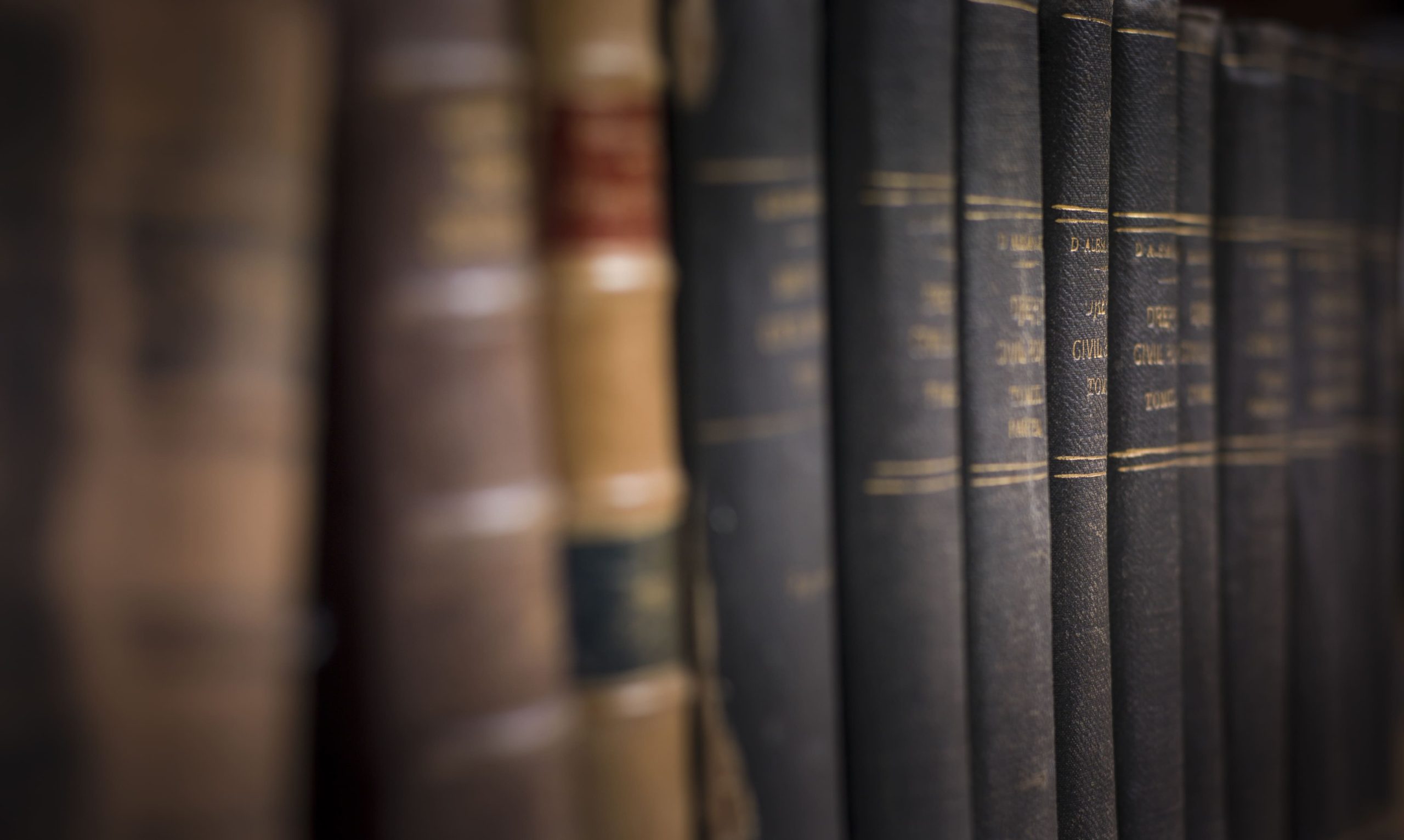 Image of a stack of books in a bookshelf